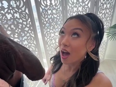 Asian beauty in lingerie fulfills big black cock fantasy